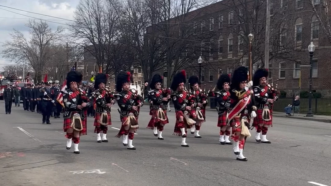 A band marching in the Greater Bridgeport St. Patrick’s Day Parade